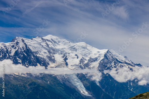 Mont Blanc, Monte Bianco mountain summit snow dome above the Chamonix valley in France. Highest peak in Europe in the Alps, alpice scenic view of Montblanc