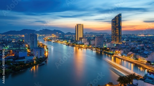 Cityscape with River at Sunset and Lights