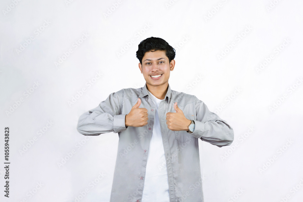 Young Teenager in shirt and vest gives expression of happiness and sadness points with gestures with hands Young Teenager in shirt and vest gives expression of happiness and sadness points with gestures with hands