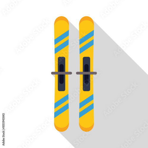 Pair of yellow mountain skis with bindings, ready for winter sports adventures