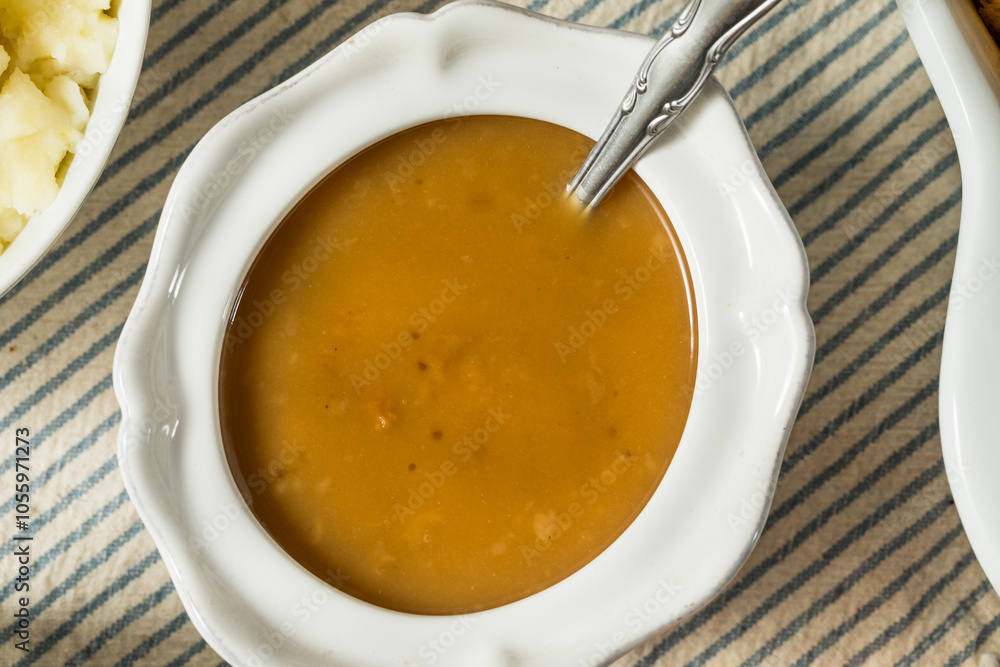 Homemade Thanksgiving Turkey Gravy in a Bowl Homemade Thanksgiving Turkey Gravy in a Bowl