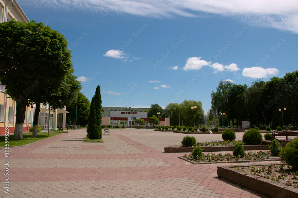 Fototapeta premium Central square in the city of Chechersk on a sunny summer day, Gomel region, Belarus