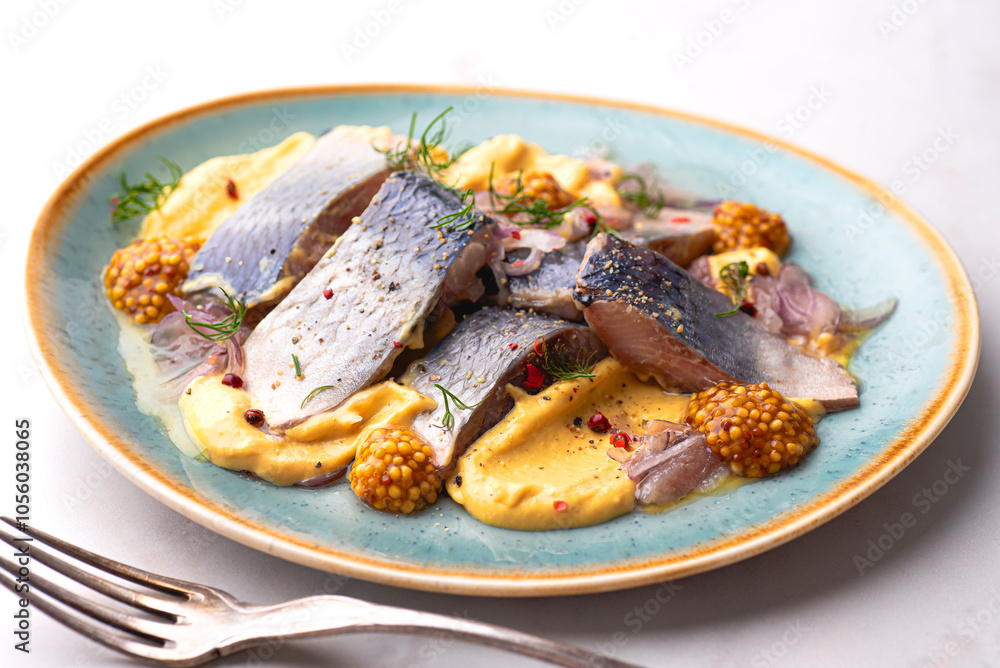 Swedish style herring with mustard dressing seasoned with a variety of peppers, sweet and salty taste, Baltic herring. Iconic Scandinavian snacks and appetizers full of omega 3 and source of protein Swedish style herring with mustard dressing seasoned with a variety of peppers, sweet and salty taste, Baltic herring. Iconic Scandinavian snacks and appetizers full of omega 3 and source of protein