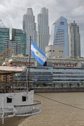 The Argentina flag with Buenos Aires skyscrapers in the background