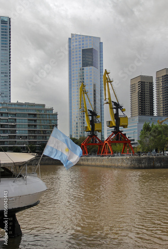 The Argentina flag with Buenos Aires skyscrapers in the background