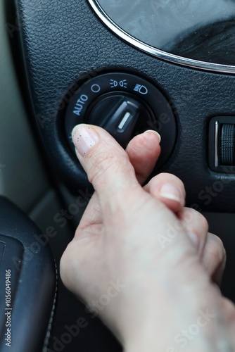 Low beam headlights - hand turning on the lights in the car
