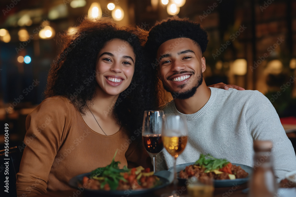 Couple enjoying a romantic dinner with wine and gourmet food in a cozy restaurant Couple enjoying a romantic dinner with wine and gourmet food in a cozy restaurant