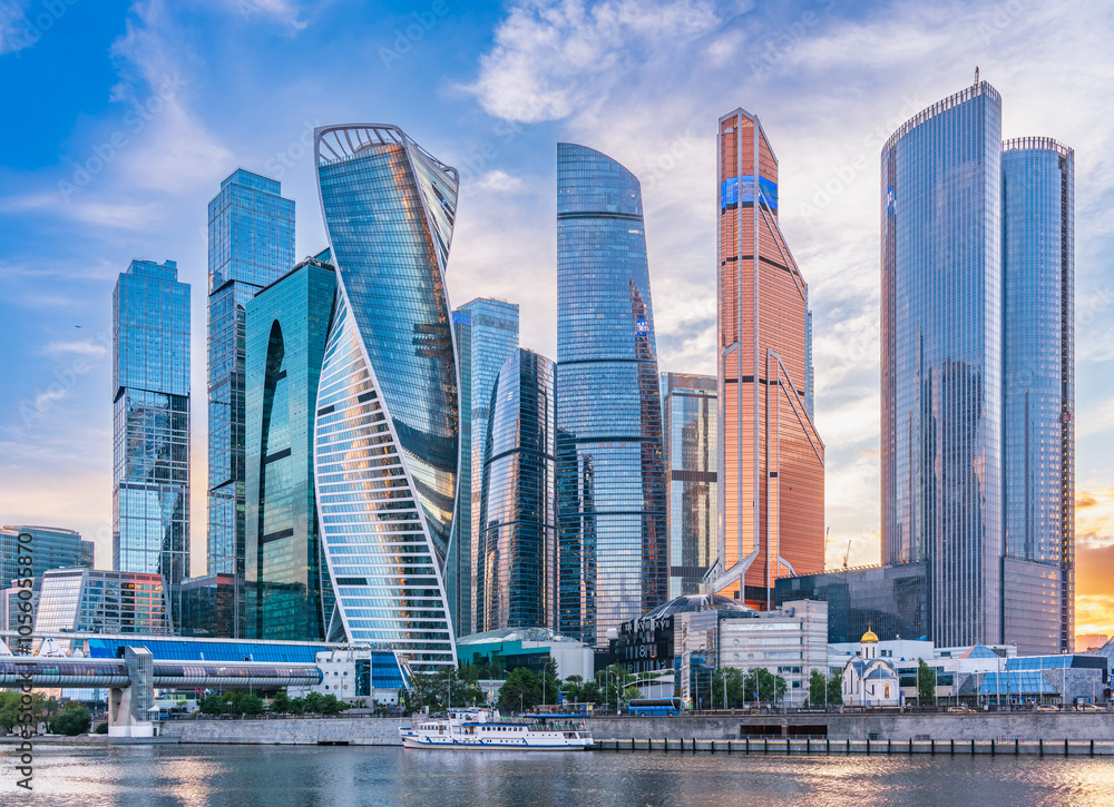 Obraz premium High buildings of Moscow-City at Moskva River at summer sunset, Russia.