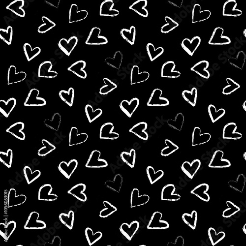 Foto A seamless pattern of various hand-drawn white hearts tossed on a black backgrou