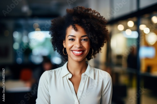 Smiling portrait of a young African American businesswoman in office