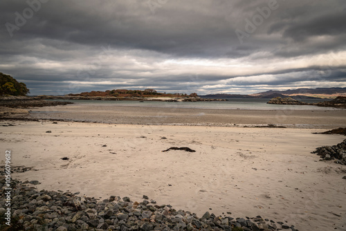 A cloudy, autumnal HDR image of an empty Samalaman Bay with Samalaman Island in the background, Glenuig, Moidart, Lochaber, Scotland. photo