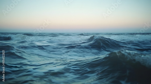 A Serene Ocean at Dawn Where Gentle Waves Whisper Against a Pastel Horizon