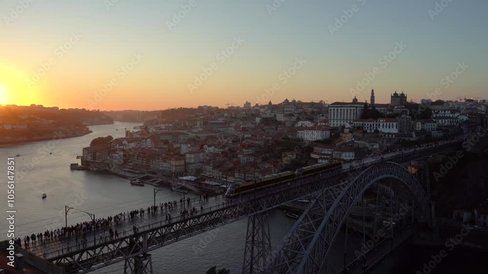 Porto City, Douro River and Dom Luis bridge I with Tram. View from Tourist Viewpoint Miradouro da Serra do Pilar at Sunset. Portugal Porto City, Douro River and Dom Luis bridge I with Tram. View from Tourist Viewpoint Miradouro da Serra do Pilar at Sunset. Portugal