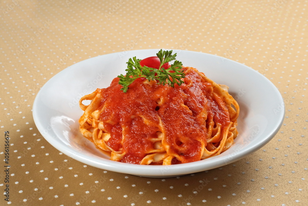 fettuccine with tomato sauce on plate fettuccine with tomato sauce on plate