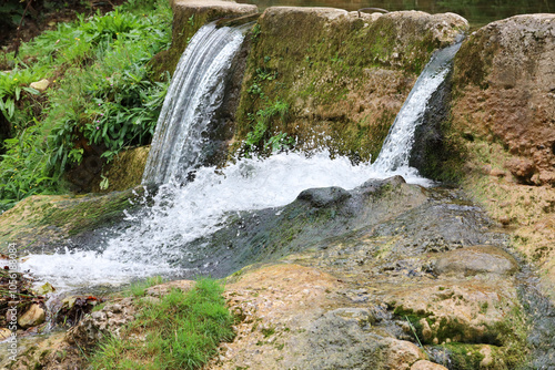 The Gorgo de la Escalera waterfall in Anna town photo