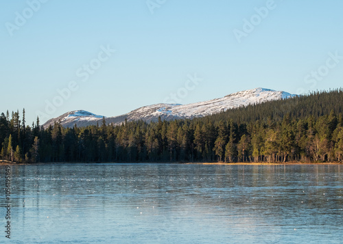 frozen lake in swedish mountains