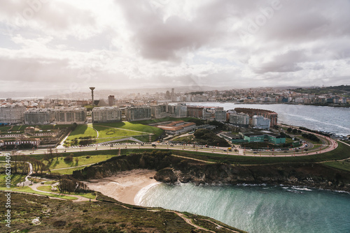 Aerial view of A Coruna cityscape from the tower of hercules with coastline and beach