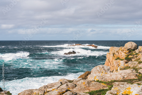 Rocky coastline with ocean waves in A Coruna, Spain