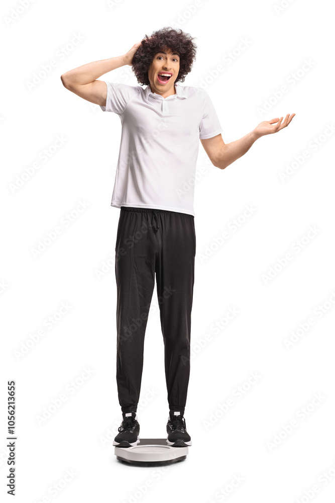 Confused guy in tracksuit on a weight scale Confused guy in tracksuit on a weight scale