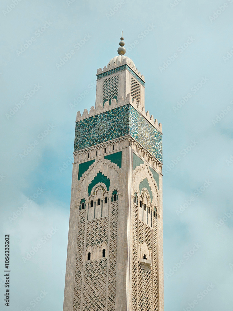 Fototapeta premium view of the famous Hassan II Mosque Minaret against blue sky - Casablanca, Morocco