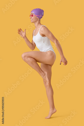 Happy young female swimmer ...