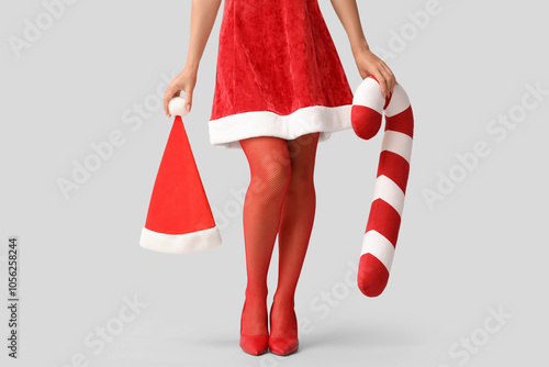 Woman in santa dress and re...