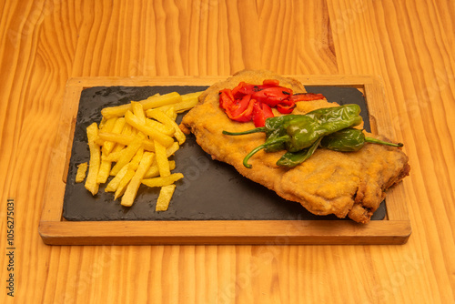 Although there is no exact record of its origin, it is believed that cachopo arose from the creativity of some Asturian cook who was looking for a hearty and tasty dish photo