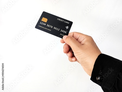 Hand Holding Black Credit Card isolated on white background 