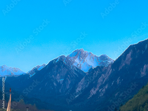 Jiuzhaigou Valley in Aba, Sichuan - Beautiful view of snow-capped mountains and blue sky