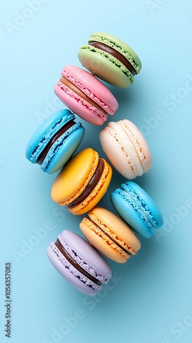 Wallpaper Mural Colorful assortment of macarons on blue background perfect for dessert lovers and pastry enthusiasts Torontodigital.ca