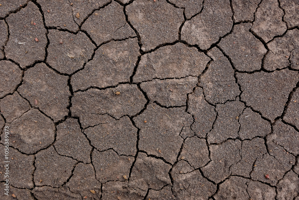Wall texture soil dry crack pattern of drought lack of water of nature brown old broken background. Wall texture soil dry crack pattern of drought lack of water of nature brown old broken background.