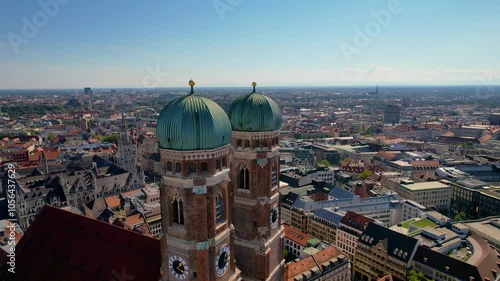 Beautiful aerial footage of  Frauenkirche gothic church, Marienplatz and the magestic New Town Hall, in the City of Munich Babaria Germany photo