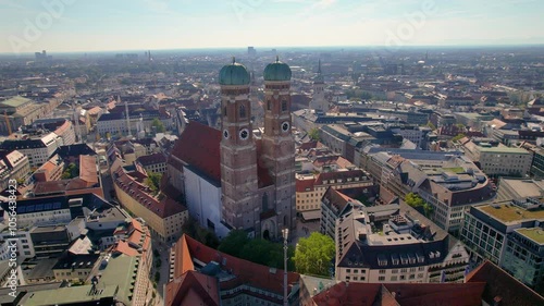 Beautiful aerial footage of  Frauenkirche gothic church, Marienplatz and the magestic New Town Hall, in the City of Munich Babaria Germany photo