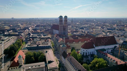 Beautiful aerial footage of  Frauenkirche gothic church, Marienplatz and the magestic New Town Hall, in the City of Munich Babaria Germany photo