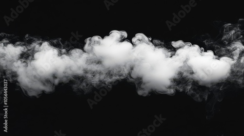 Elegant white smoke gracefully billowing against a stark black background.