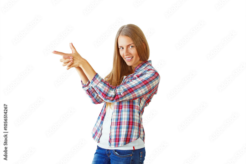 Woman in a plaid shirt pointing with fingers on a white background, smiling confidently. Concept of direction or guidance Woman in a plaid shirt pointing with fingers on a white background, smiling confidently. Concept of direction or guidance