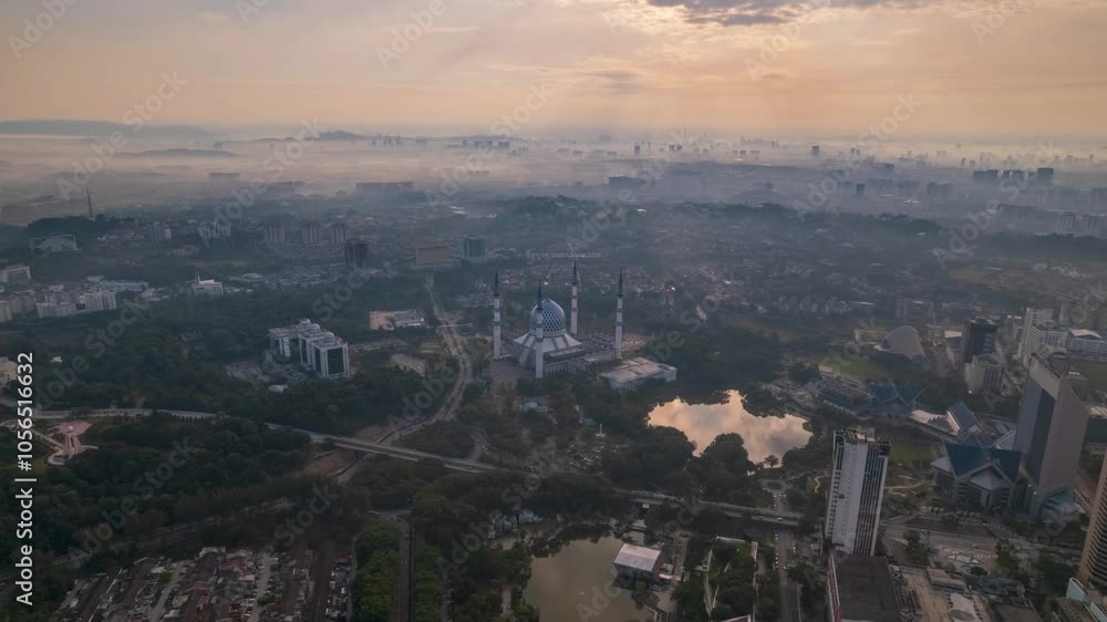 The majestic mosque stands as a beacon amidst the urban landscape, a testament to Malaysian architecture. The majestic mosque stands as a beacon amidst the urban landscape, a testament to Malaysian architecture.