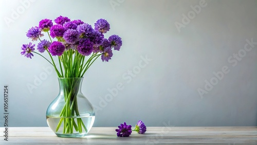 Wallpaper Mural An arrangement of fresh purple flowers in a modern glass vase on a simple background, home decor, arrangement, floral, purple flowers Torontodigital.ca