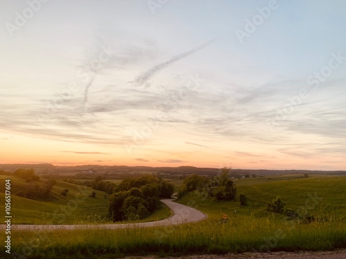 sunset over the windy road