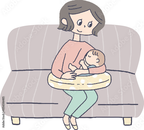 ソファに座って授乳をするお母さん