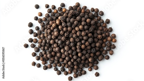 Heap of black pepper seeds isolated on a white background viewed from above