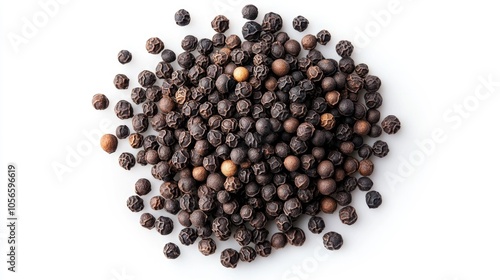 Heap of black pepper seeds isolated on a white background viewed from above