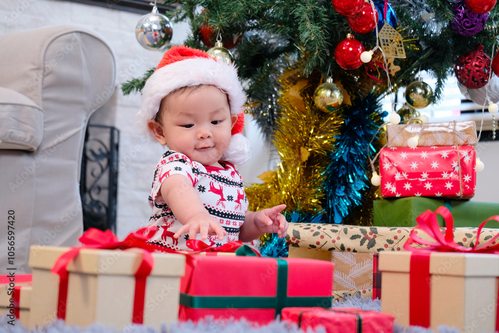 Cute boy wearing Santa Claus costume celebrating Christmas. Cute boy wearing Santa Claus costume celebrating Christmas.