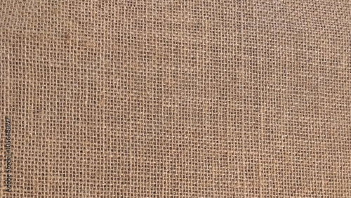 Natural sack texture brown canvas fabric design. Rough cloth high definition image