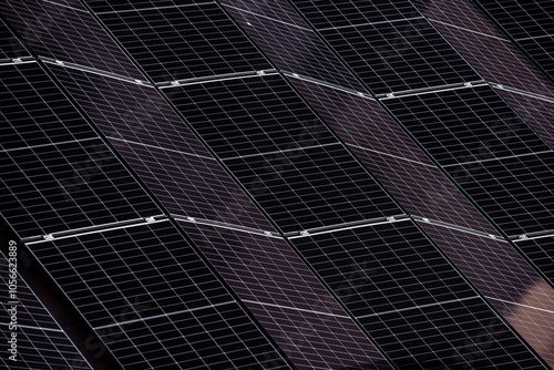 Abstract close-up of solar panels arranged in a diagonal pattern, showcasing clean energy technology and renewable energy themes.