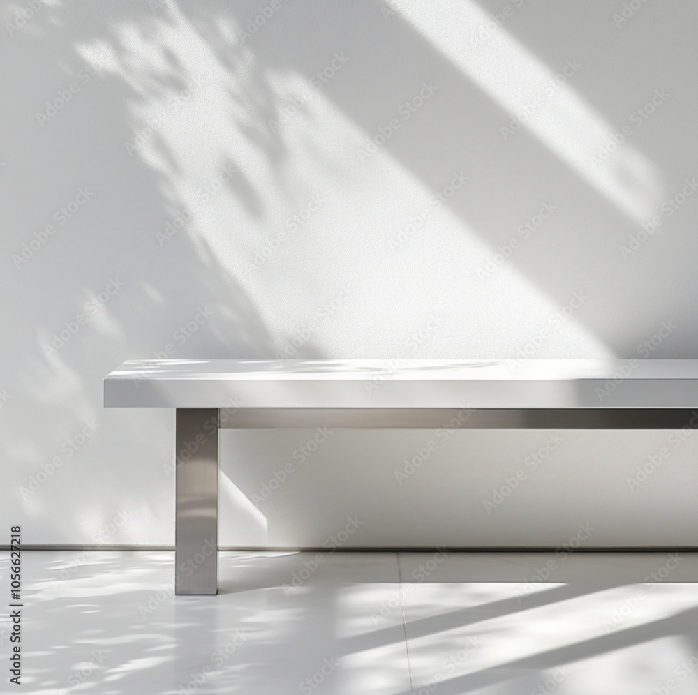 Obraz premium white bench, stainless steel legs, window light and shadow on the wall, product photography, close-up of white metal frame bench with leather top, clean white background, professional studio lighting
