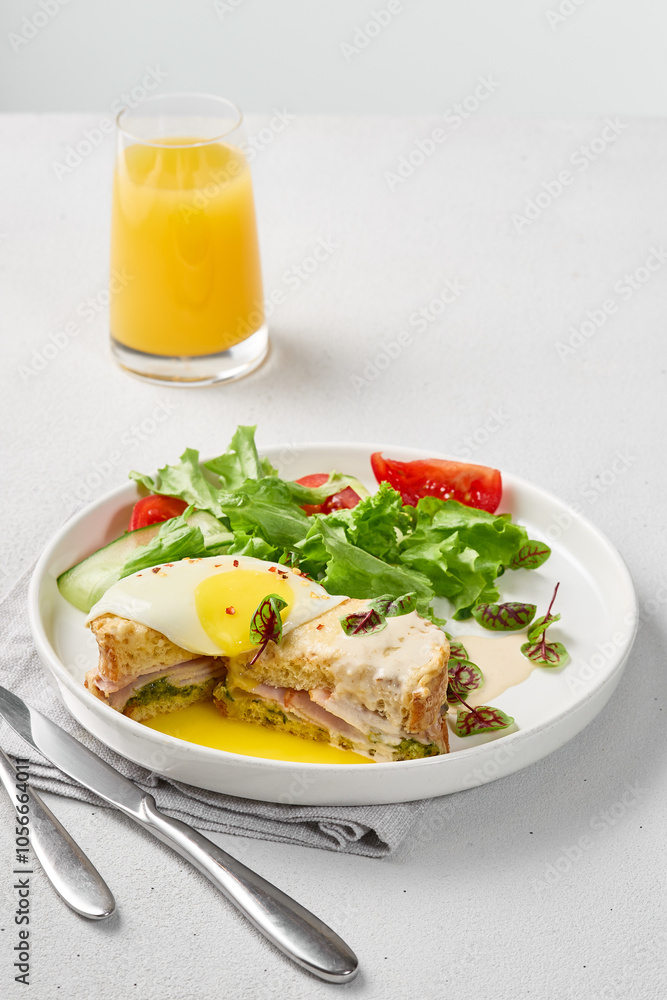 Elegant Croque Madame with Mixed Salad on Minimalist White Background Elegant Croque Madame with Mixed Salad on Minimalist White Background