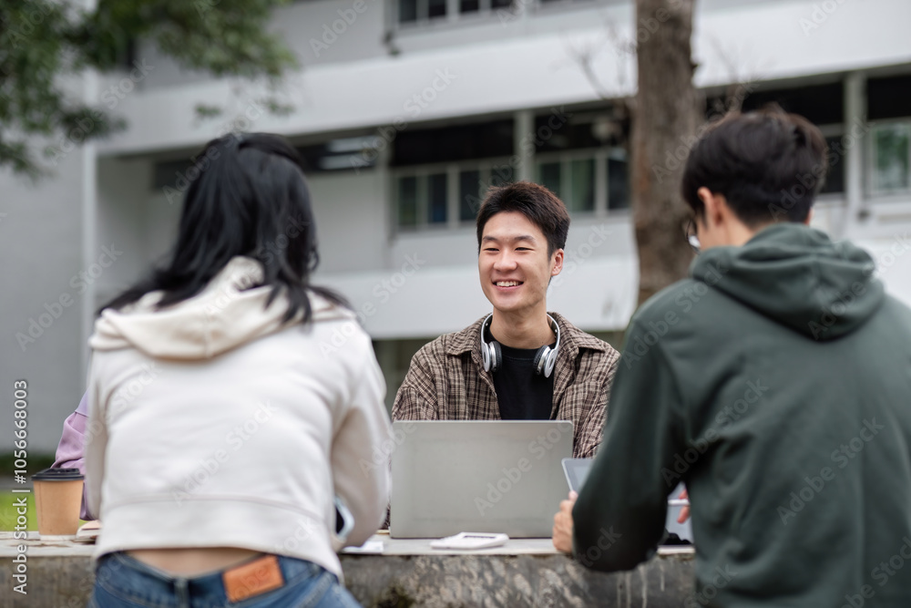 Students Gather in Groups to Study for Exams Outdoors at University Campus Students Gather in Groups to Study for Exams Outdoors at University Campus