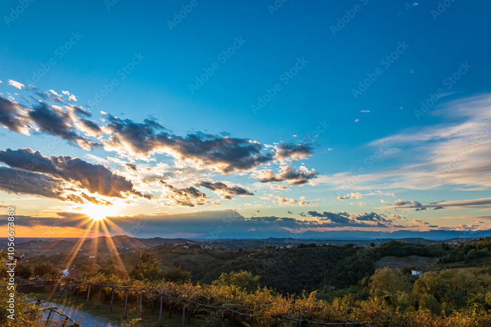 Colorful sunset in the vineyards at the border between Italy and Slovenia
