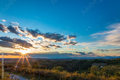 Obraz na płótnie Colorful sunset in the vineyards at the border between Italy and Slovenia w salonie